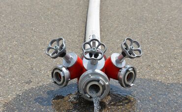 Pumpe Überschwemmung Überflutung Feuerwehrschlauch