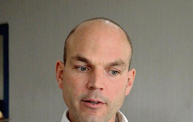 Portrait Buergermeister-Kandidat Axel Fischer, der einen Aktionstag zur Wahl veranstaltet.