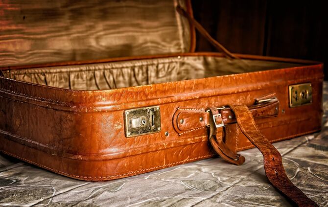 Koffer Gepäck Gepäckstück Symbol Symbolbild Symbolfoto