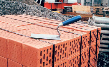 kelle bauen baustelle ahus bauen symboi symbolbild symbolfoto