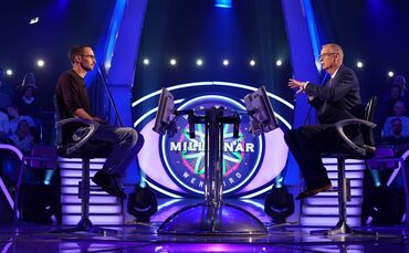 Da hatte schon alles wieder seine Ordnung: Axel Wolf (links) mit Günther Jauch in dessen Sendung "Wer wird Millionär?".