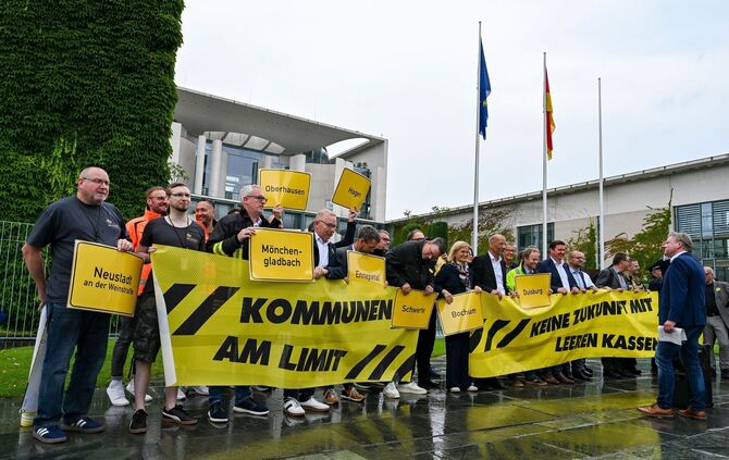 Kommunen demonstrieren für mehr Unterstützung