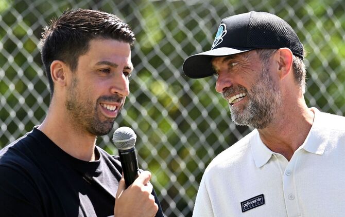Sami Khedira (l) und Jürgen Klopp
